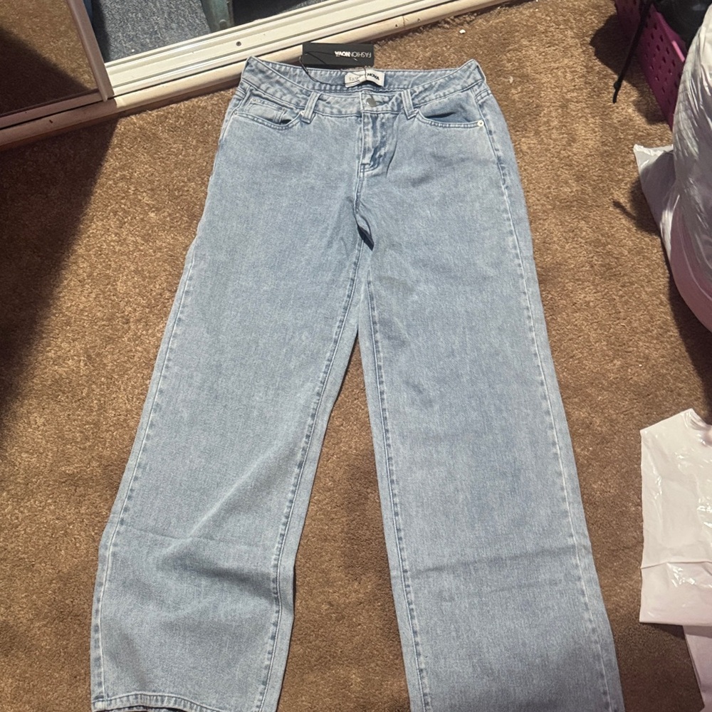 Stylish Blue Jeans with Pink Bow Detail - Picture 6 of 10